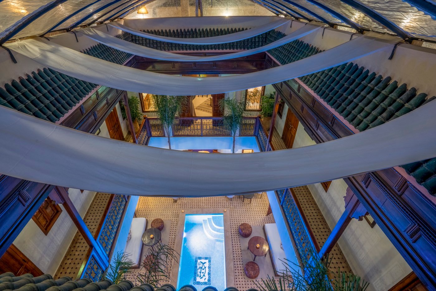 The courtyard from directly overhead, framed by the canvas shades